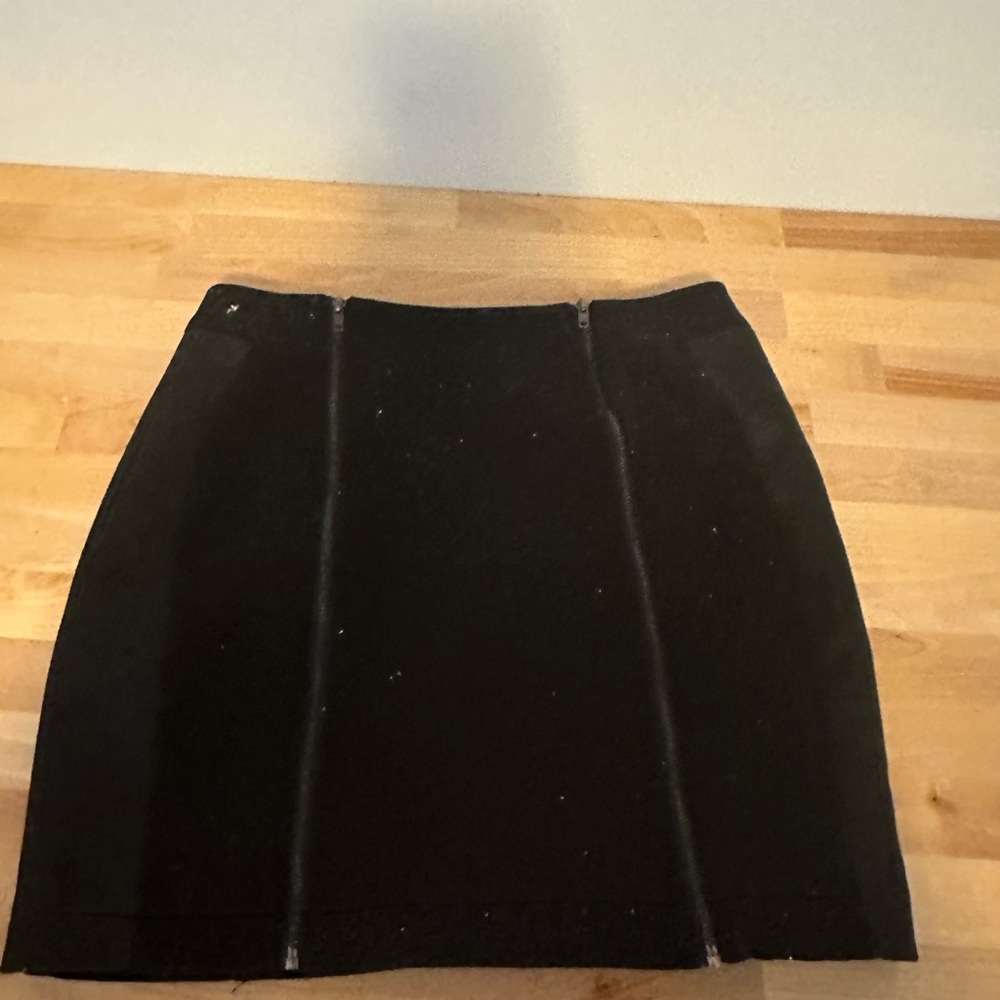 Black suede and faux leather skirt.